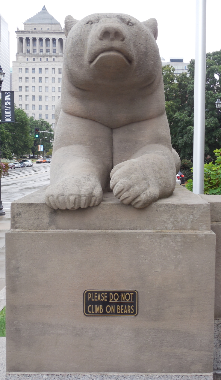 The 'Do not Climb on Bears' sign on a Peabody statue